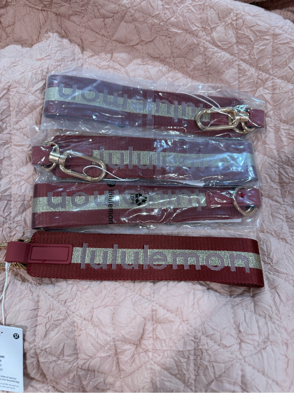 lululemon athletica Burgundy and Metallic Strap Key/Card Holder. I have 3